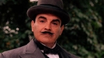 David Suchet as Hercule Poirot in a garden in Wilbraham Crescent